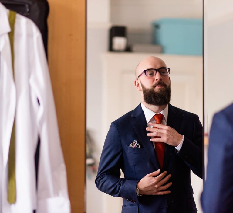 Groom in Suit Supply Wedding Suit