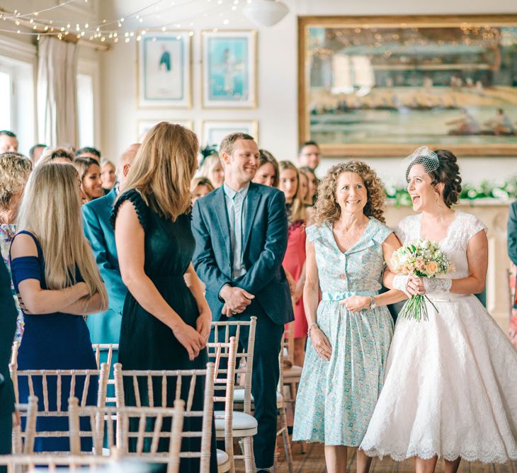 Vegan Wedding Reception With Bride In 50s Style Dress At The London Rowing Club With Charity Flowers & Images by Matt Ethan Photography