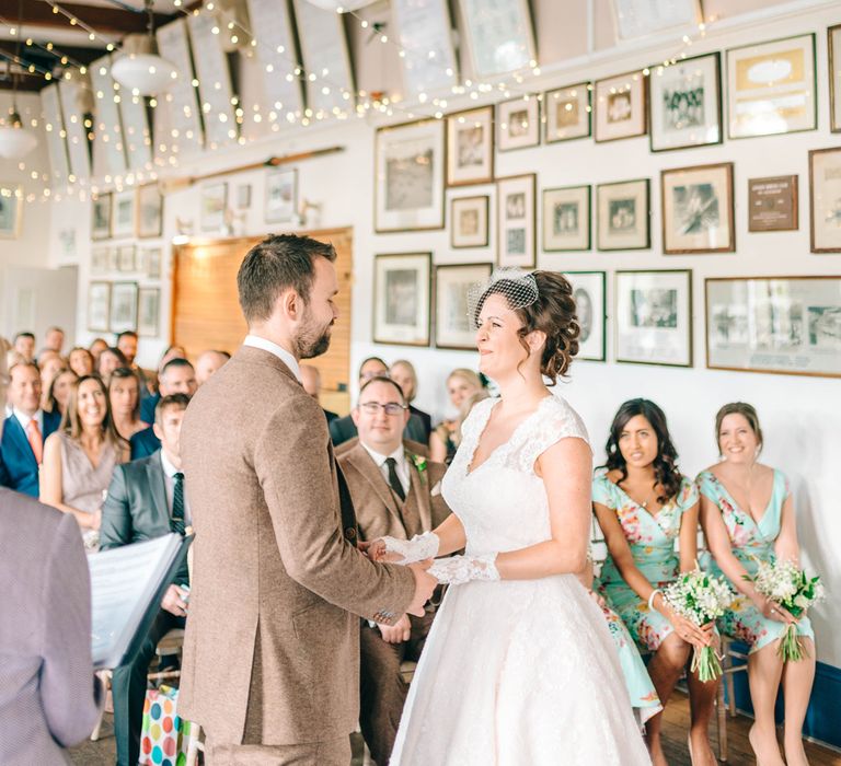 Vegan Wedding Reception With Bride In 50s Style Dress At The London Rowing Club With Charity Flowers & Images by Matt Ethan Photography