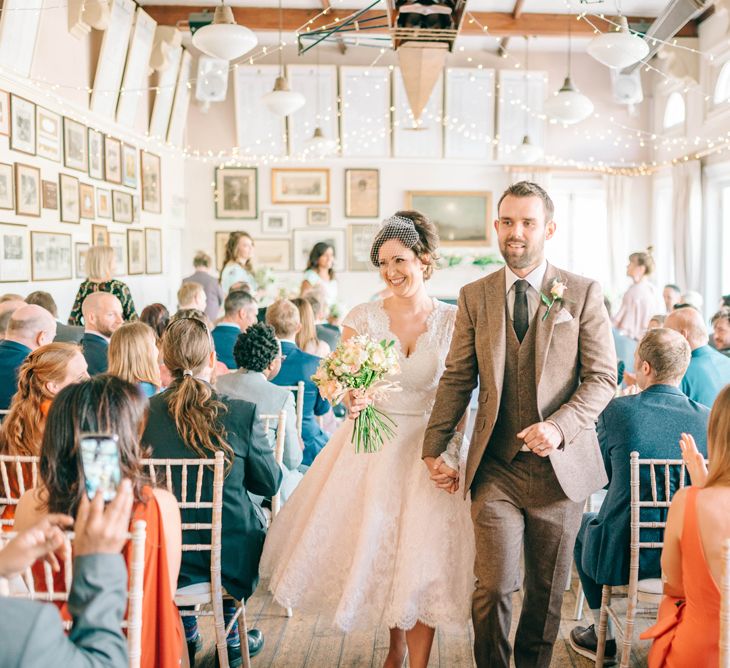 Vegan Wedding Reception With Bride In 50s Style Dress At The London Rowing Club With Charity Flowers & Images by Matt Ethan Photography