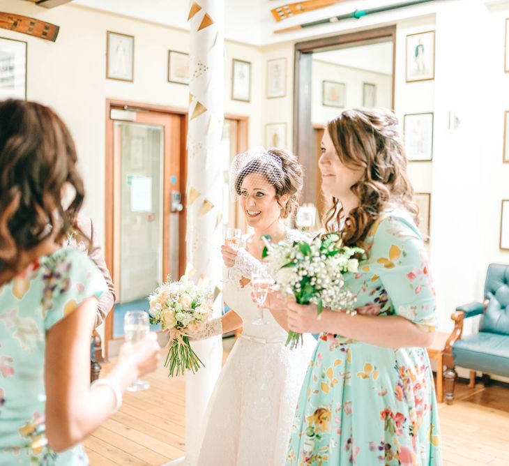 Vegan Wedding Reception With Bride In 50s Style Dress At The London Rowing Club With Charity Flowers & Images by Matt Ethan Photography