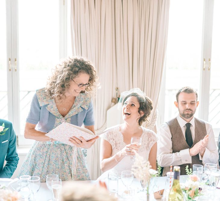 Vegan Wedding Reception With Bride In 50s Style Dress At The London Rowing Club With Charity Flowers & Images by Matt Ethan Photography