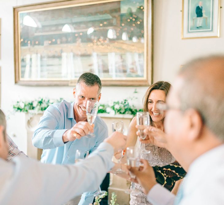 Vegan Wedding Reception With Bride In 50s Style Dress At The London Rowing Club With Charity Flowers & Images by Matt Ethan Photography