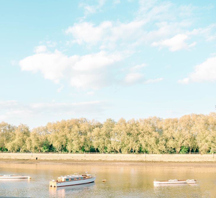 Vegan Wedding Reception With Bride In 50s Style Dress At The London Rowing Club With Charity Flowers & Images by Matt Ethan Photography