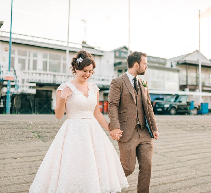 Vegan Wedding Reception With Bride In 50s Style Dress At The London Rowing Club With Charity Flowers & Images by Matt Ethan Photography