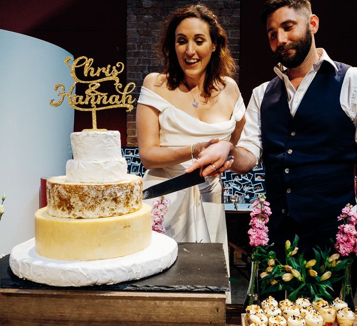 Cutting the Cake | Bride in Halfpenny Separates | Groom in Yardsmen Suit | Urban Wedding at Village Underground, London | Marianne Chua Photography