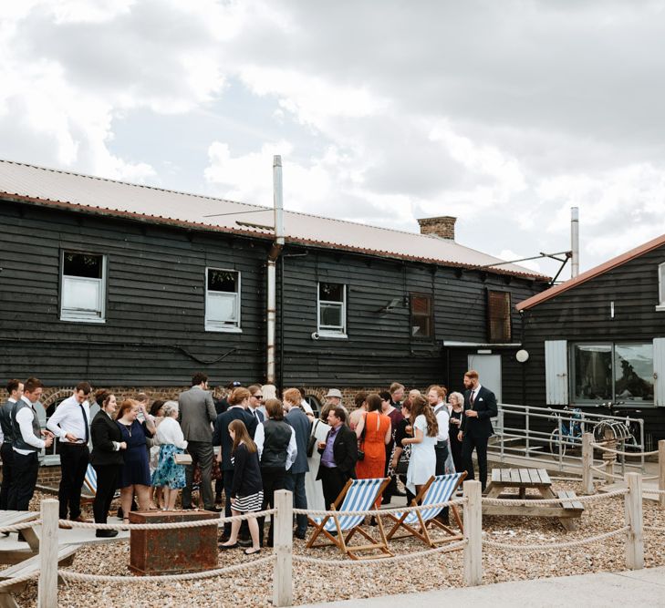 Coastal Wedding At East Quay Venue Whitstable With Bride In Claire La Faye With Floral Crown And Images From Green Antlers Photography