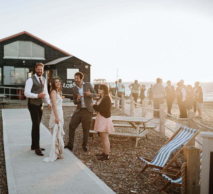 Coastal Wedding At East Quay Venue Whitstable With Bride In Claire La Faye With Floral Crown And Images From Green Antlers Photography