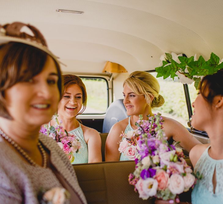 Lace Wedding Dress & Mint Bridesmaid Dresses from Vintage Rose Bridal | Navyblur Photography | Cinematic Tide Films