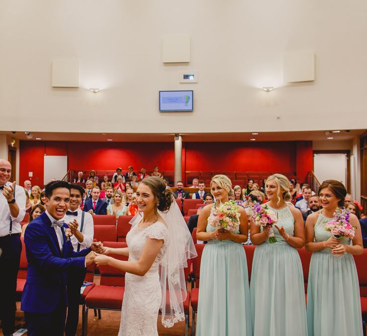 Religious Wedding Ceremony | Bride in Lace Dress | Groom in Navy Suit | Navyblur Photography | Cinematic Tide Films