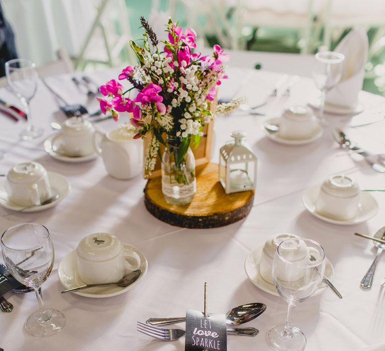 Tree Slice & Flowers in Jars Centrepiece | Navyblur Photography | Cinematic Tide Films