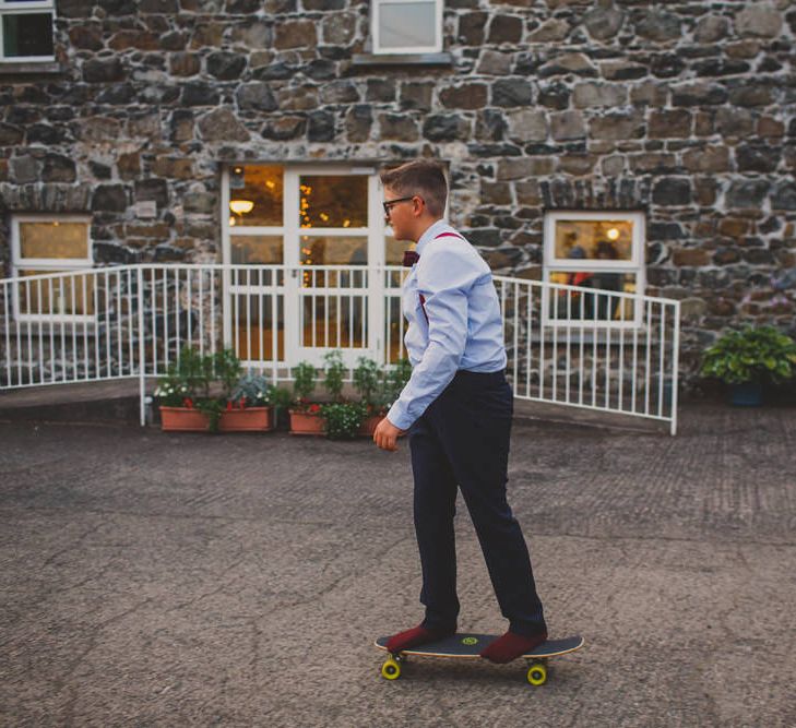 Young Wedding Guest on Skateboard | Navyblur Photography | Cinematic Tide Films