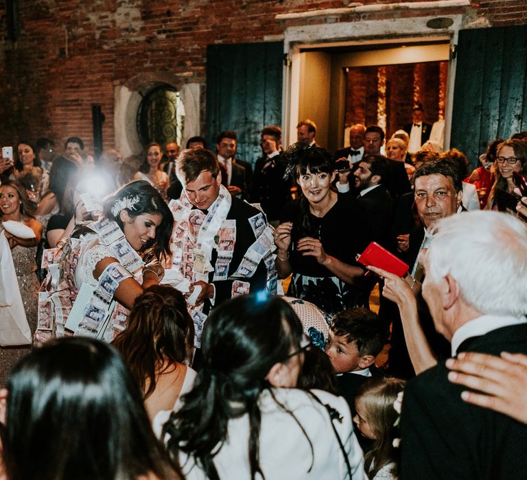 Greek Dancing | Bride in Berta Bridal Gown | Groom in Black Tuxedo | Super Luxe Greek Wedding at The Cipriani in Venice | Bridgwood Wedding Photography