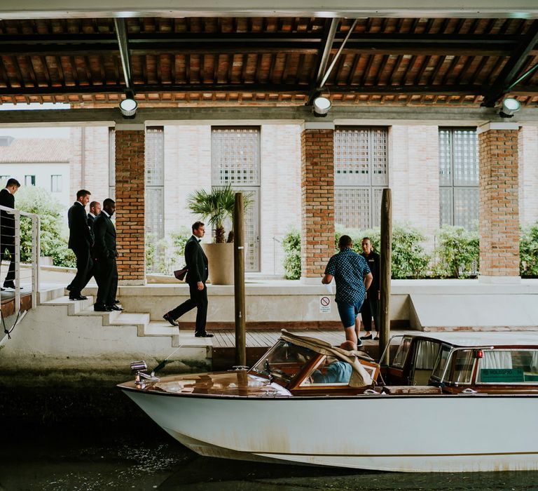 Boat Ride | Groomsmen in Black Tuxedos | Super Luxe Greek Wedding at The Cipriani in Venice | Bridgwood Wedding Photography