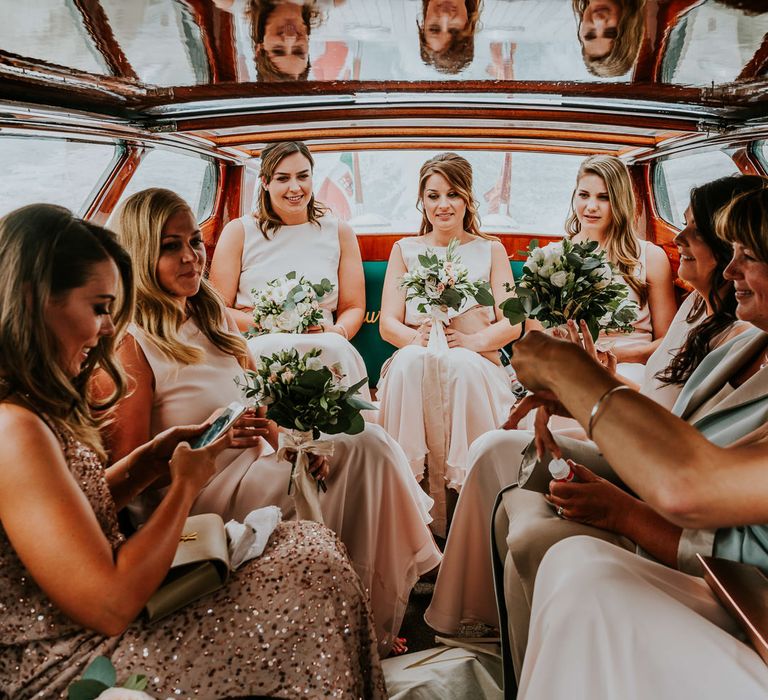 Boat Ride | Bridesmaids in Pink Maids to Measure Dresses | Super Luxe Greek Wedding at The Cipriani in Venice | Bridgwood Wedding Photography