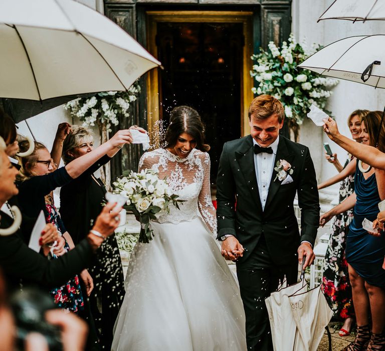 Confetti Moment | Bride in Romona Keveza Gown | Groom in Black Tuxedo | Super Luxe Greek Wedding at The Cipriani in Venice | Bridgwood Wedding Photography