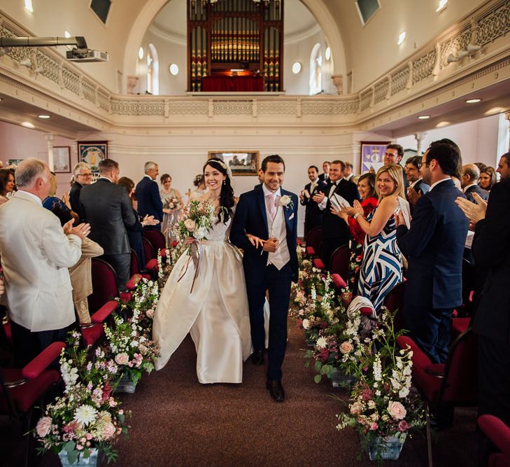 Bride in Aire Barcelona Bridal Gown & Groom in Ted Baker Church Ceremony