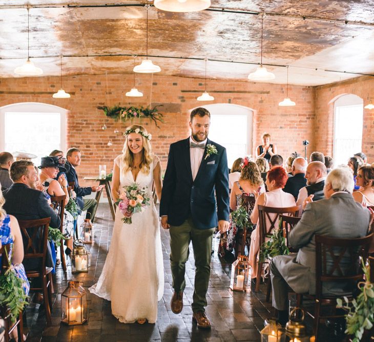 Bride in Bespoke Mariée Wedding Dress & Groom in Slater Jacket & Topman Chino's by Matt Brown Photography