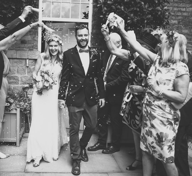 Confetti Moment with Bride in Bespoke Mariée Wedding Dress & Groom in Slater Jacket & Topman Chino's by Matt Brown Photography