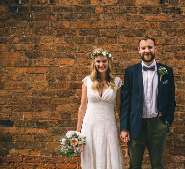 Bride in Bespoke Mariée Wedding Dress & Groom in Slater Jacket & Topman Chino's by Matt Brown Photography