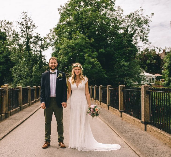 Bride in Bespoke Mariée Wedding Dress & Groom in Slater Jacket & Topman Chino's by Matt Brown Photography