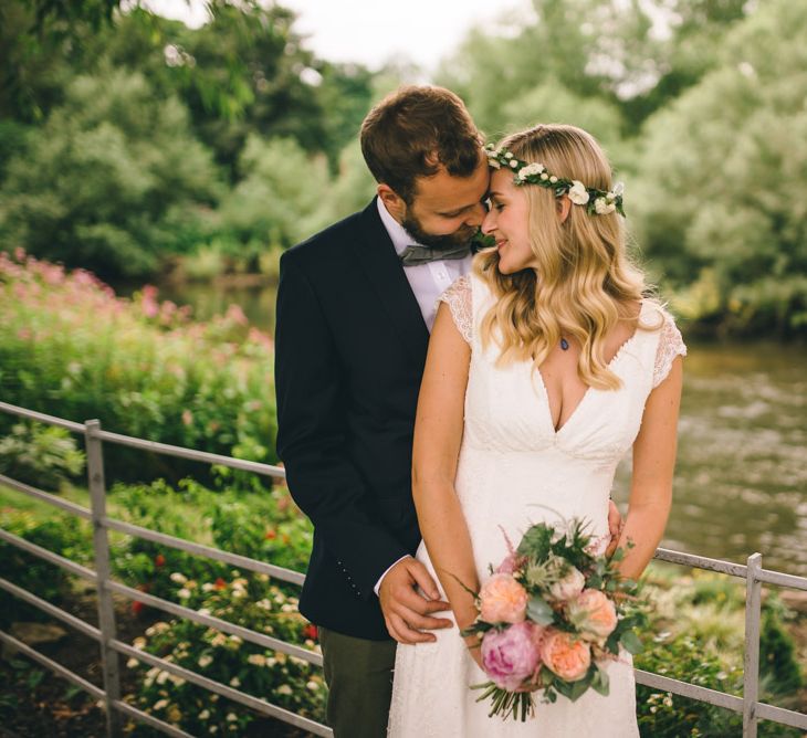 Bride in Bespoke Mariée Wedding Dress & Groom in Slater Jacket & Topman Chino's by Matt Brown Photography