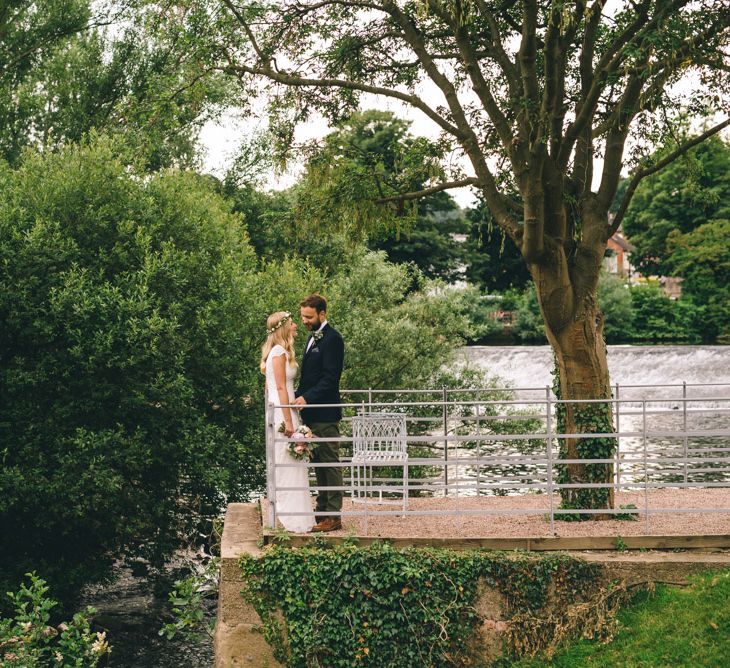 Bride in Bespoke Mariée Wedding Dress & Groom in Slater Jacket & Topman Chino's by Matt Brown Photography