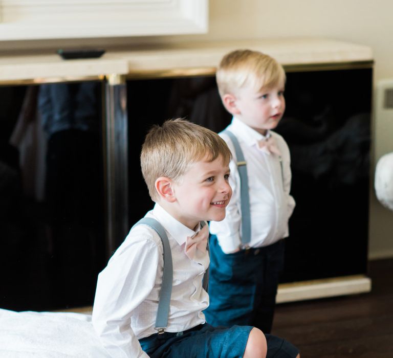 Page Boys in Shorts, Braces & Bow Ties | Elegant Blush Pink & White Wedding at Aynhoe Park in Oxfordshire | Lucy Davenport Photography