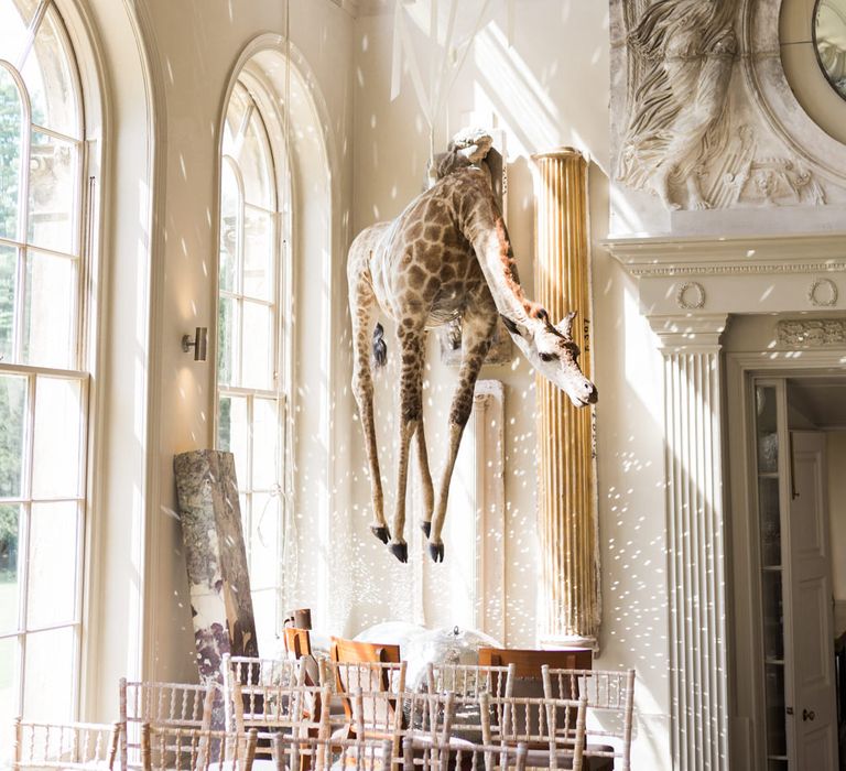 Hanging Giraffe | Elegant Blush Pink & White Wedding at Aynhoe Park in Oxfordshire | Lucy Davenport Photography