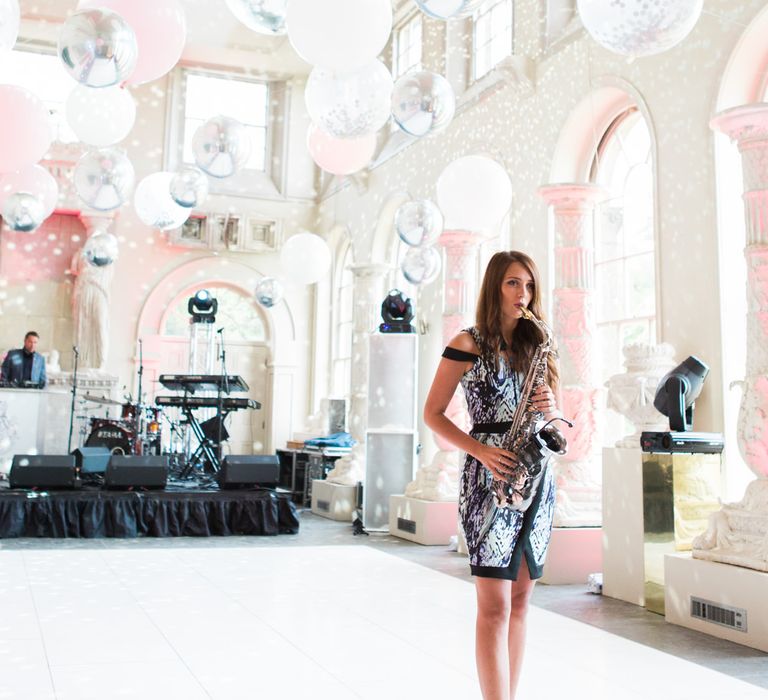 Saxophonist | Elegant Blush Pink & White Wedding at Aynhoe Park in Oxfordshire | Lucy Davenport Photography