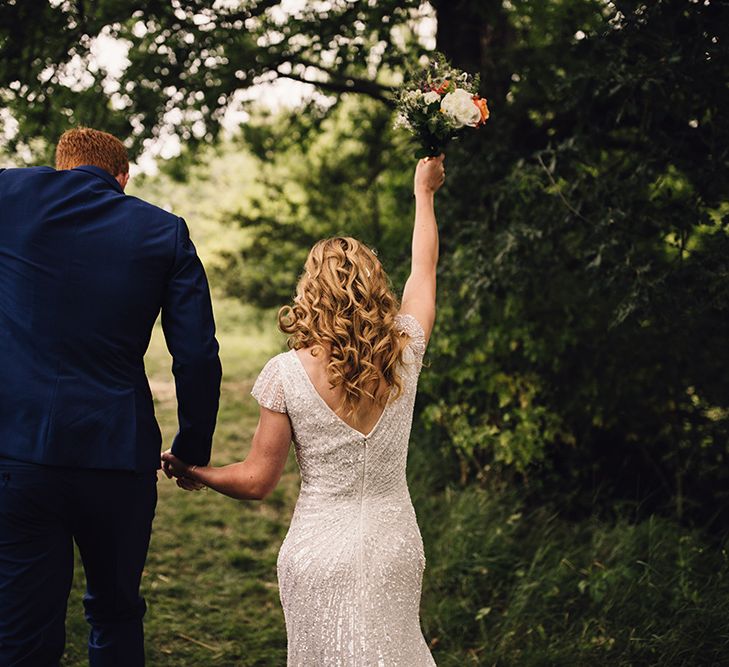 Bride in Eliza Jane Howell Gown & Groom in Navy Paul Smith Suit