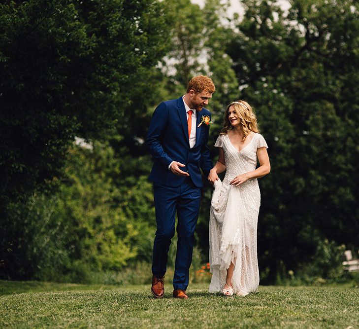 Bride in Eliza Jane Howell Gown & Groom in Navy Paul Smith Suit