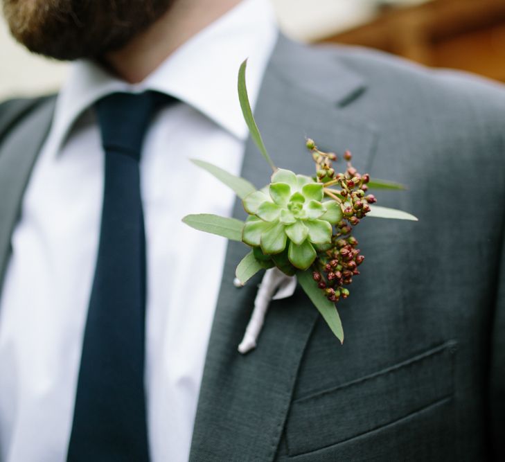 Succulent Buttonhole | Stylish Hackney Town Hall Wedding | Camilla Arnhold Photography | This Modern Revelry Film