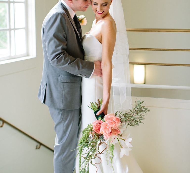 Wedding Ceremony | Bride in Anna Serrano Gown | Groom in Grey Suit | Stylish Hackney Town Hall Wedding | Camilla Arnhold Photography | This Modern Revelry Film