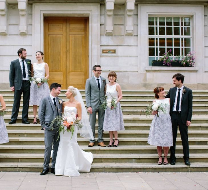 Wedding Party | Wedding Ceremony | Bride in Anna Serrano Gown | Groom in Grey Suit | Stylish Hackney Town Hall Wedding | Camilla Arnhold Photography | This Modern Revelry Film