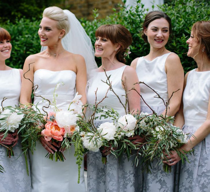 Bridesmaids in Grey & White Oasis Dresses | Anna Sorrano Wedding Dress | Stylish Hackney Town Hall Wedding | Camilla Arnhold Photography | This Modern Revelry Film