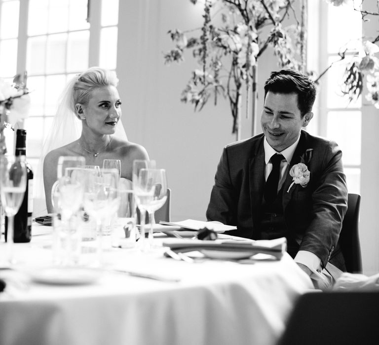 Bride in Anna Sorrano Gown | Groom in Grey Suit | Stylish Hackney Town Hall Wedding | Camilla Arnhold Photography | This Modern Revelry Film