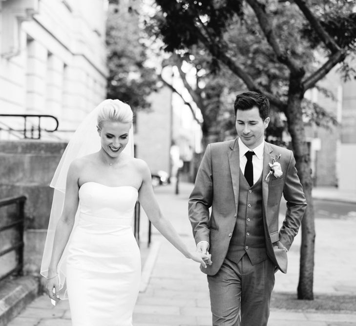 Bride in Anna Sorrano Gown | Groom in Grey Suit | Stylish Hackney Town Hall Wedding | Camilla Arnhold Photography | This Modern Revelry Film