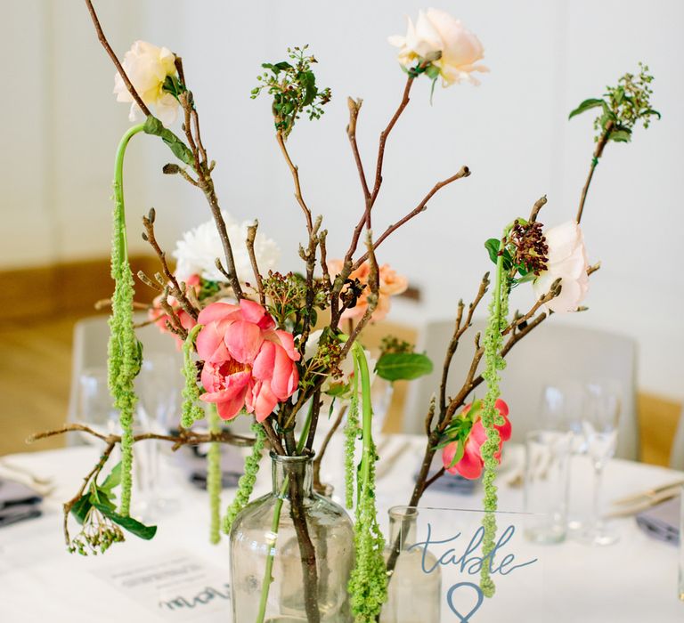 Magnolia Branch Centrepieces | Stylish Hackney Town Hall Wedding | Camilla Arnhold Photography | This Modern Revelry Film