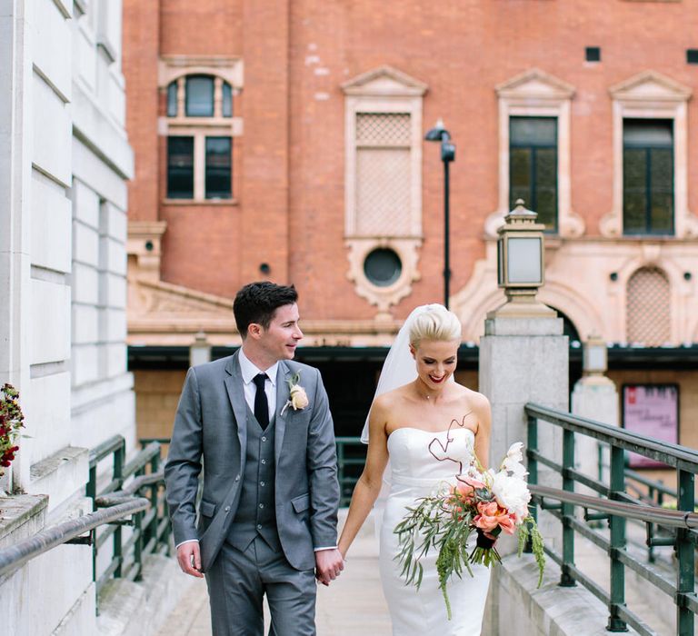 Bride in Anna Sorrano Gown | Groom in Grey Suit | Stylish Hackney Town Hall Wedding | Camilla Arnhold Photography | This Modern Revelry Film