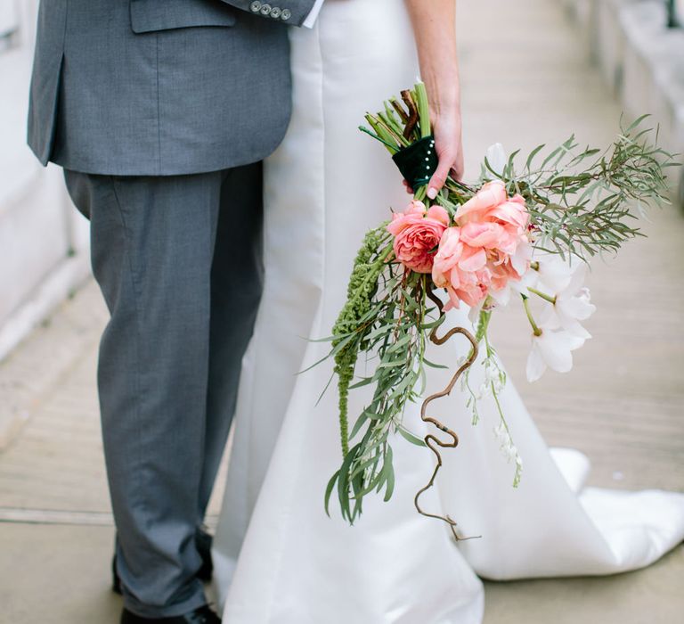 Bride in Anna Sorrano Gown | Groom in Grey Suit | Stylish Hackney Town Hall Wedding | Camilla Arnhold Photography | This Modern Revelry Film