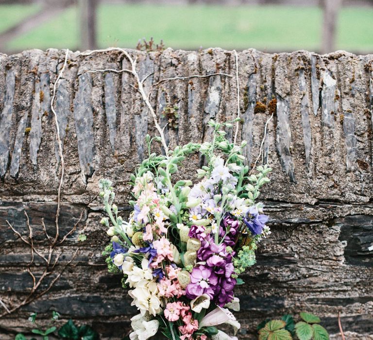 Rime Arodaky Bride For A Rustic Wild Flower Filled Wedding at Anran Devon With Mismatched Bridesmaids Dresses & Images From A Thing Like That Photography