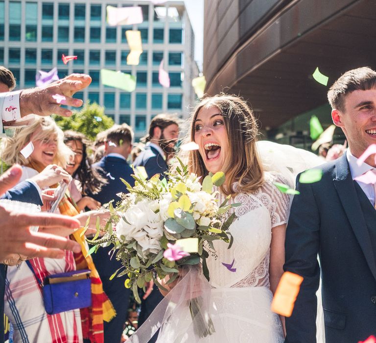 Confetti Moment | Bride in Lenora Watters Gown | Groom in Navy Suit | Contemporary City Wedding at People's History Museum & Hope Mill Theatre, Manchester Planned by Alternative Weddings MCR | Babb Photography