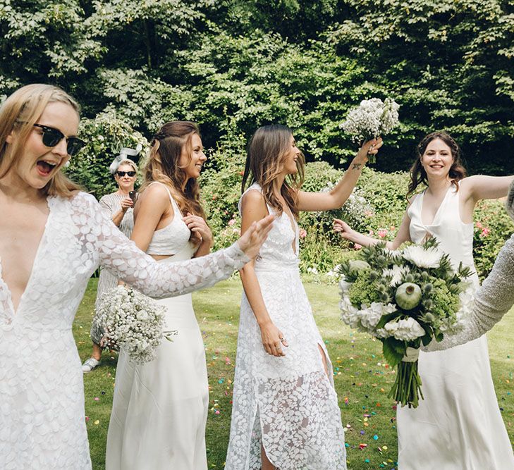 Bride & Bridesmaids in White Dresses by Harriet Holling