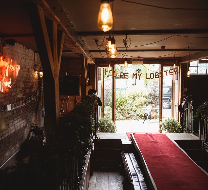 Greenery Filled Wedding At The Bell Ticehurst With Bride In Willowby By Watters Gown & Groom In Green Checked Suit With Images From Jackson & Co Photography