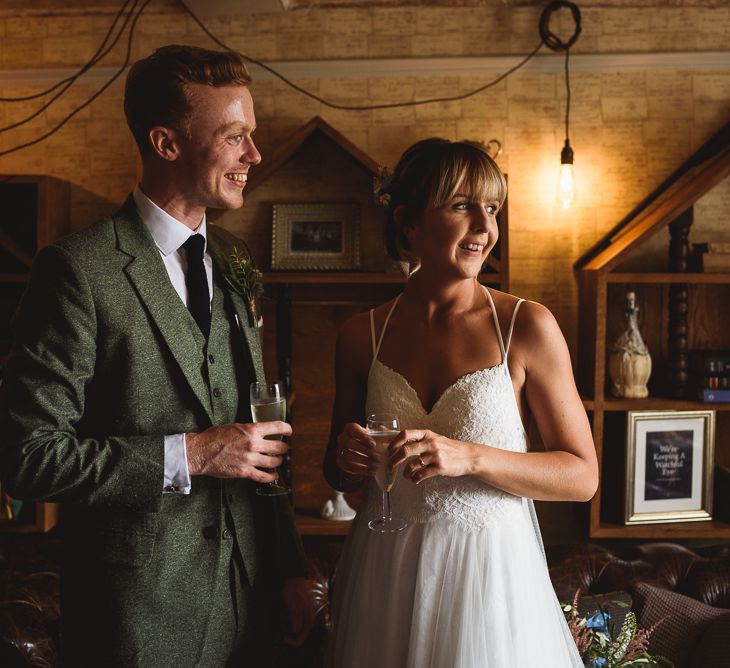 Greenery Filled Wedding At The Bell Ticehurst With Bride In Willowby By Watters Gown & Groom In Green Checked Suit With Images From Jackson & Co Photography