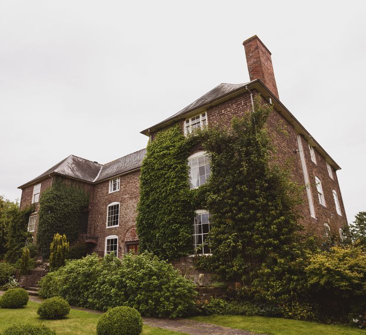 Outdoor Ceremony For A Rustic Wedding At Dewsall Court Herefordshire