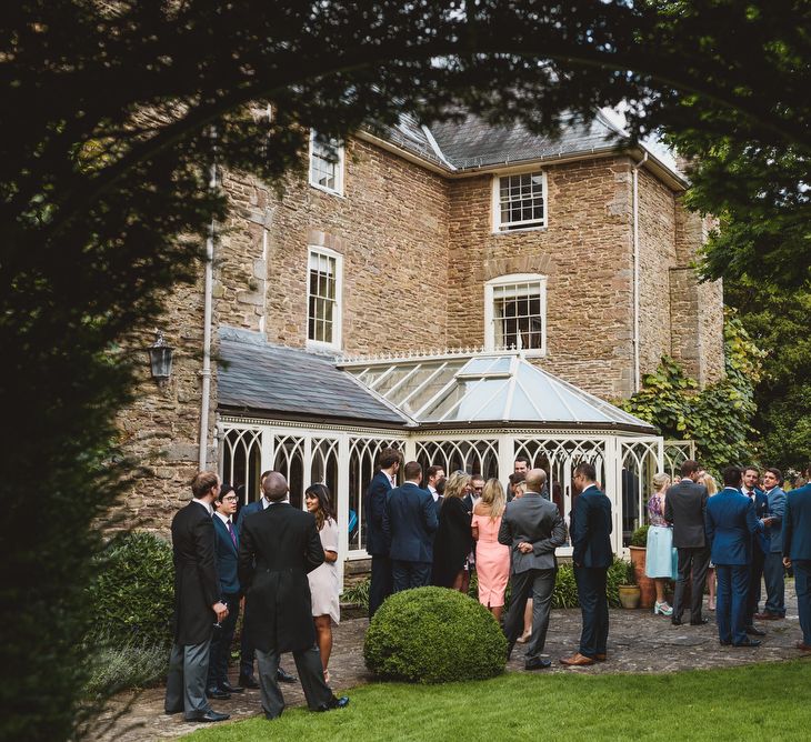 Outdoor Ceremony For A Rustic Wedding At Dewsall Court Herefordshire