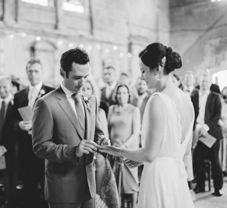 Bride & Groom Exchanging Rings at Asylum Wedding Ceremony