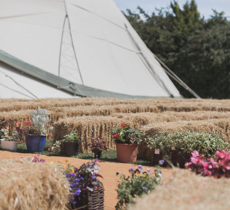 Outdoor Wedding Ceremony With Haybale Seating & Chalkboard Sign